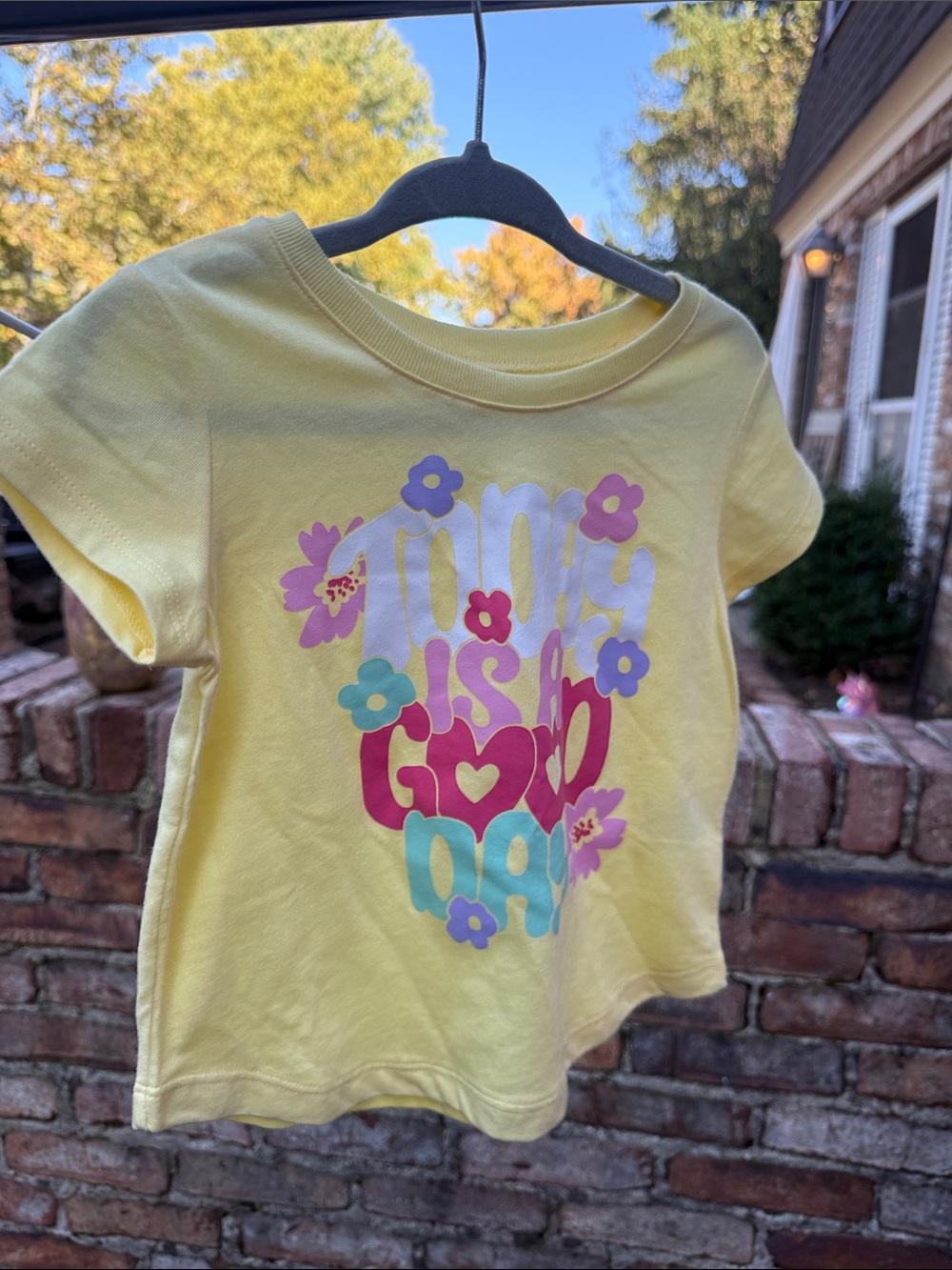 Falls Creek Yellow Short Sleeve Tee with Multi-Color Floral Graphic
